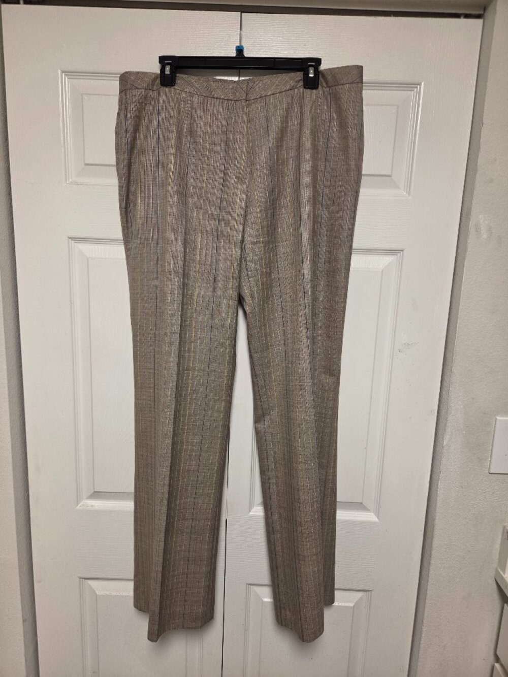 ESCADA pants . They have a delicate ,sparkly stripe running along the site.